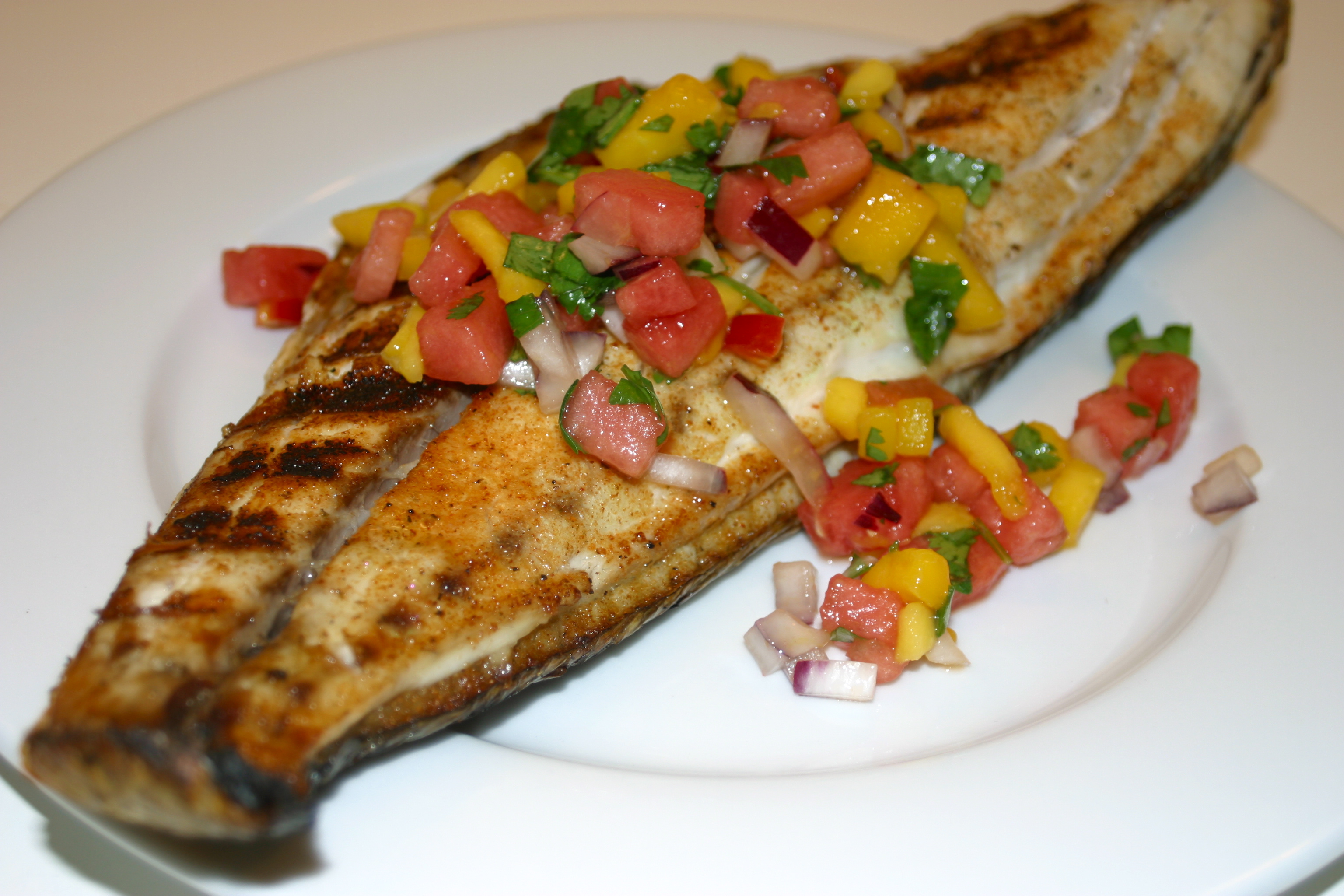 Grilled Redfish On The Halfshell Topped With Watermelon Mango